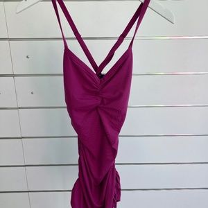 purple tank top with draw strings on sides to make top very flattering on